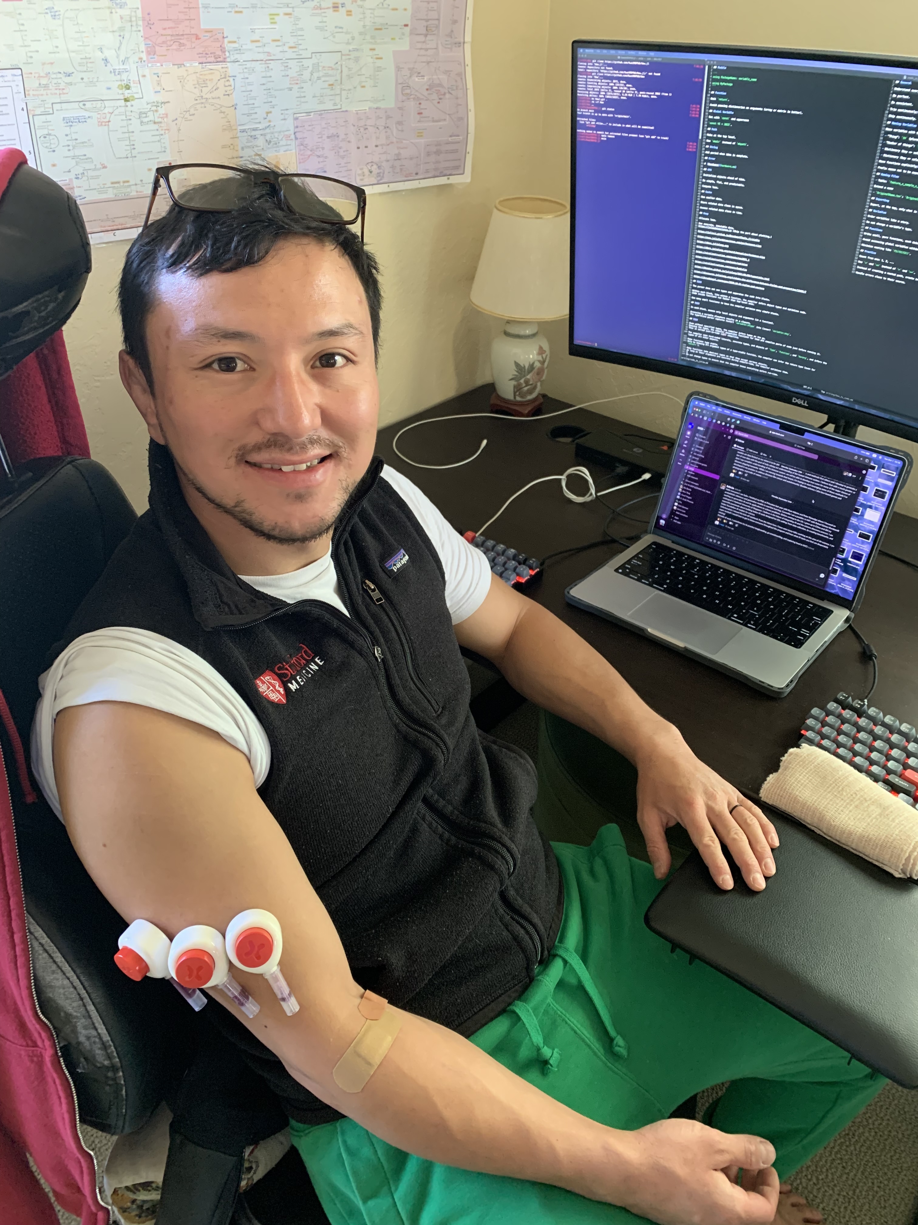 Kwat’s profile picture showing him coding and drawing his blood.